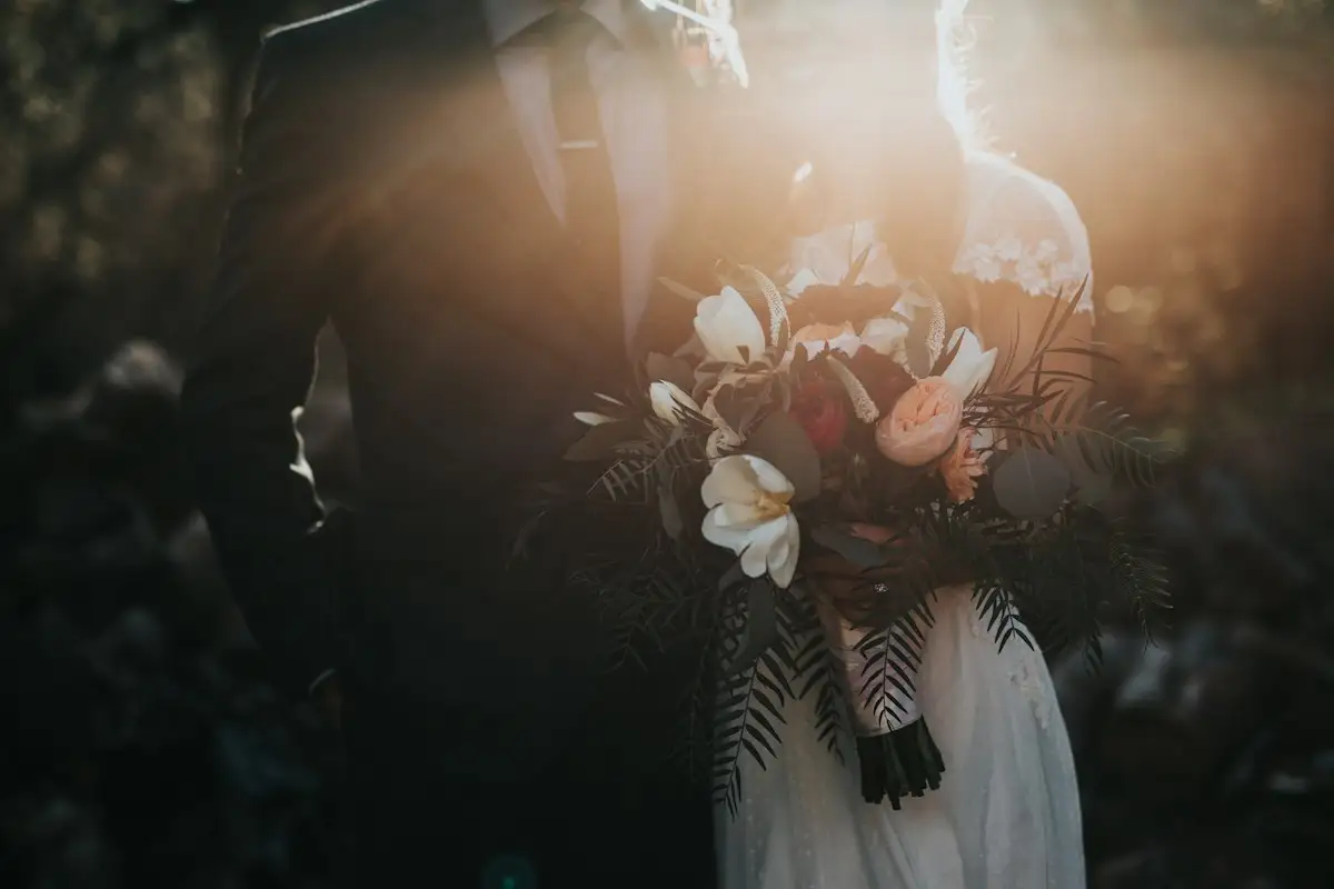 Magical outdoor French wedding celebration under twinkling fairy lights